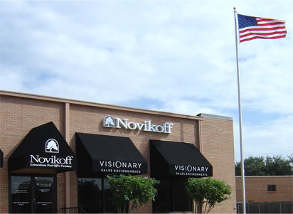 U.S. flag flying outside an office building