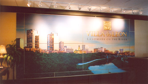 Large photograph of downtown Fort Worth, Texas mounted on the wall of a sales office