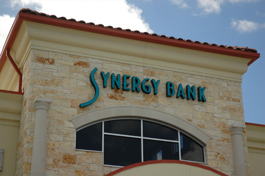 Illuminated letters mounted on the exterior of a bank
