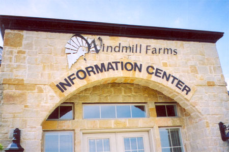 Routed lettering mounted on a stone wall at Windmill Farms